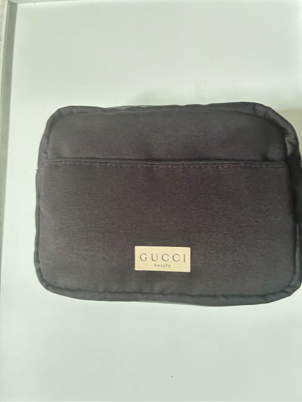 Gucci Black Toiletry Pouch with Gold Logo Plaque